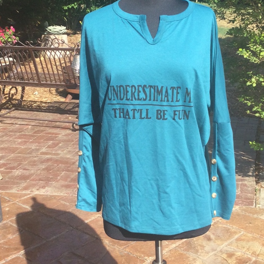 Nwot teal Underestimate Me That’ll Be Fun top. Size S.